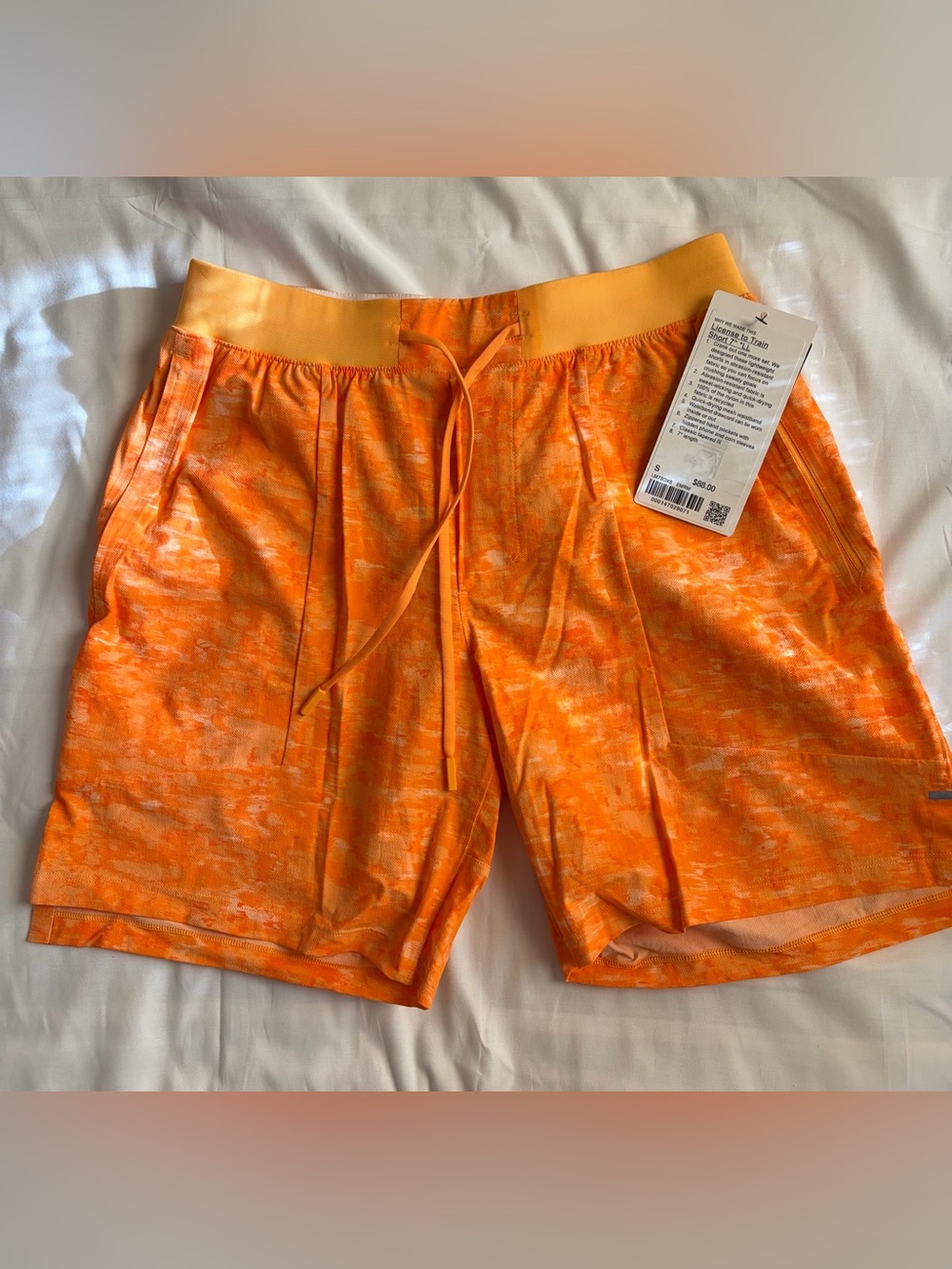 NWT Lululemon License to Train Short 7" *LL - S (Orange Marble)